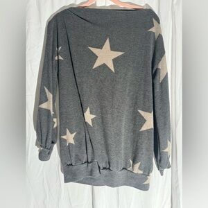 Small oversized off the shoulder long sleeve .